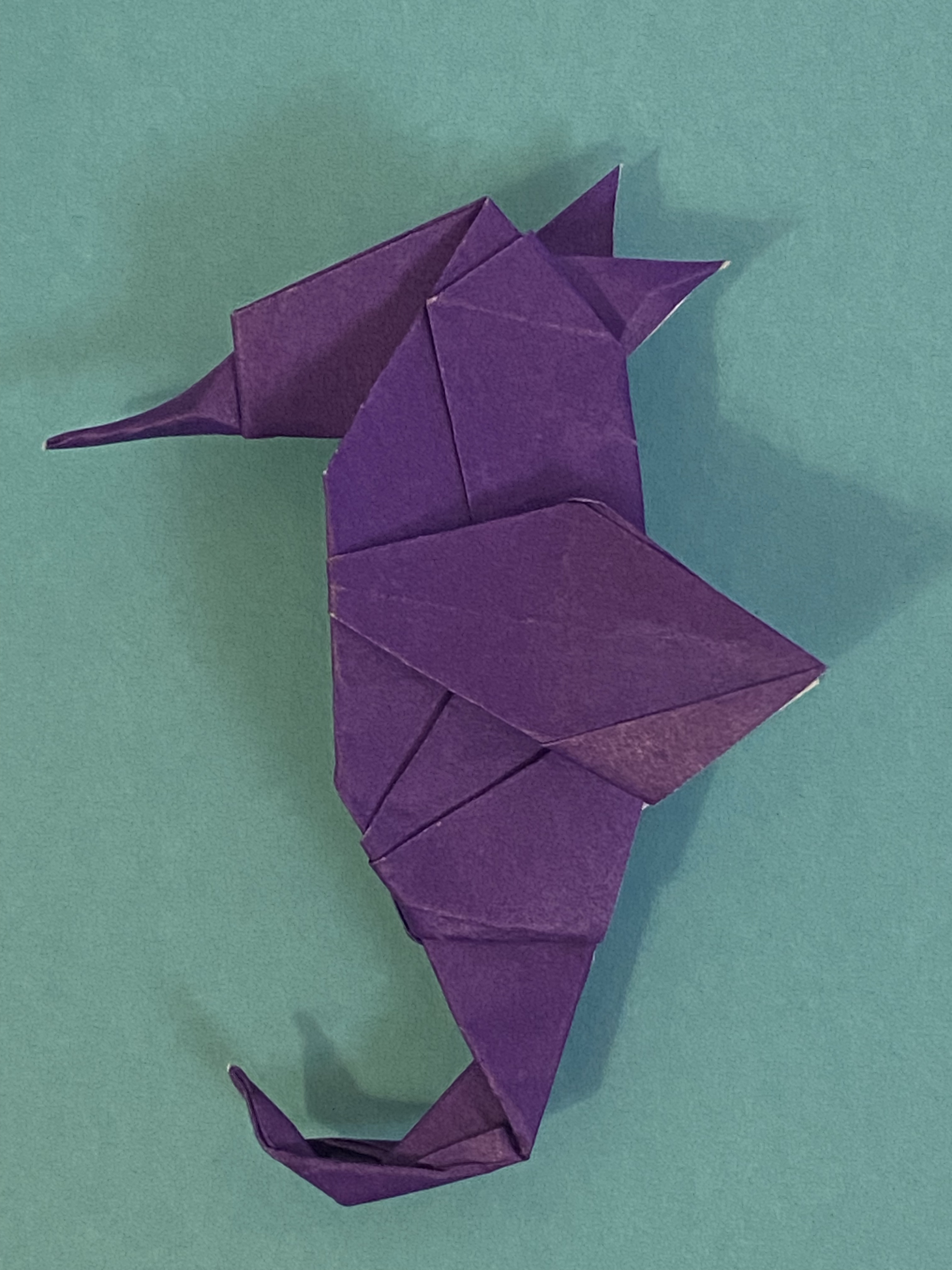 An origami seahorse, designed by Ronik Bhaskar.